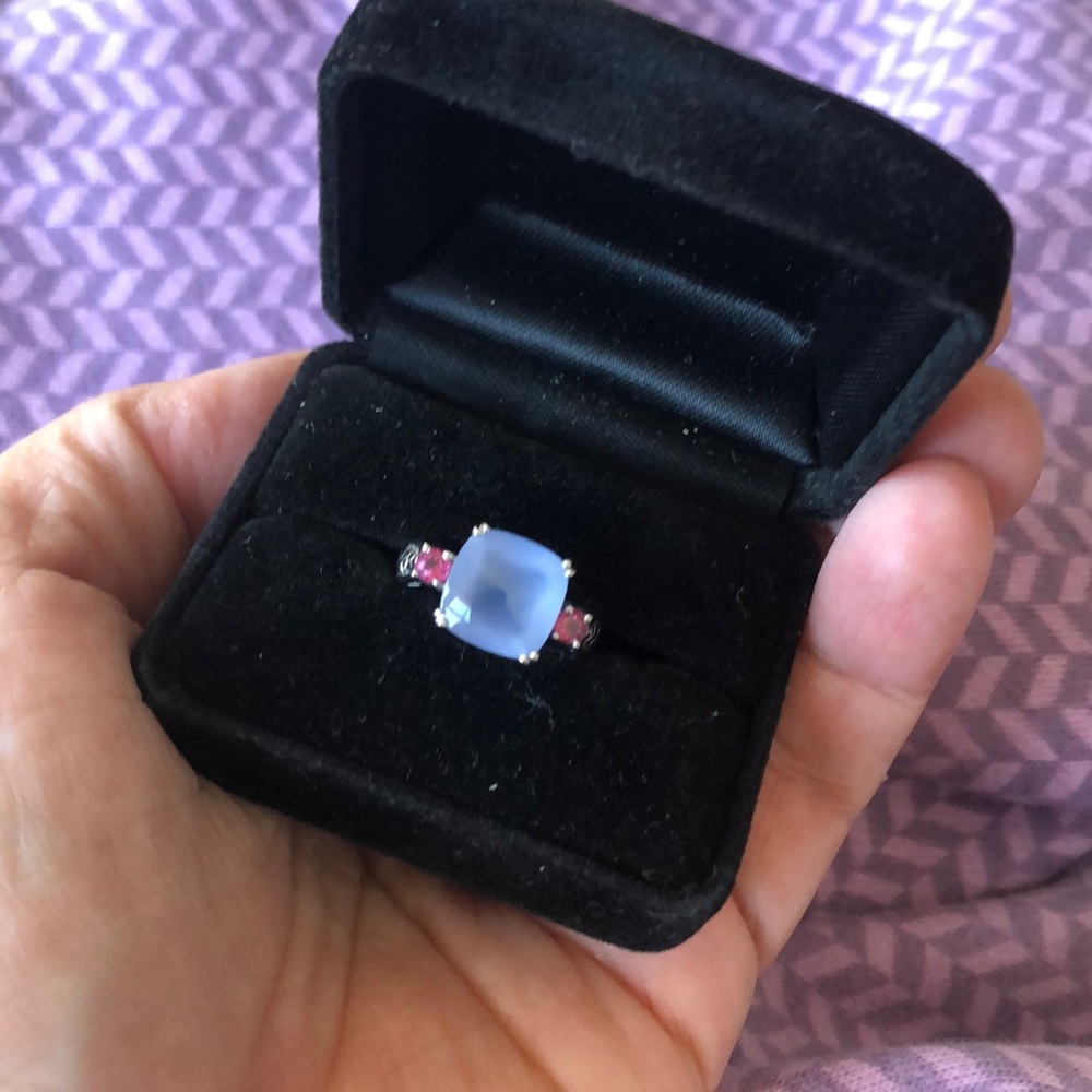 Gold ring, lavender chalcedony, pink sapphires.